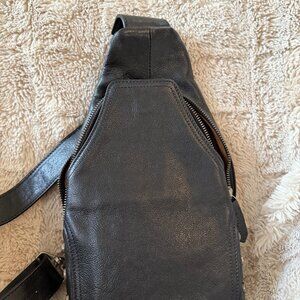 Black pebbled leather sling bag silver studs